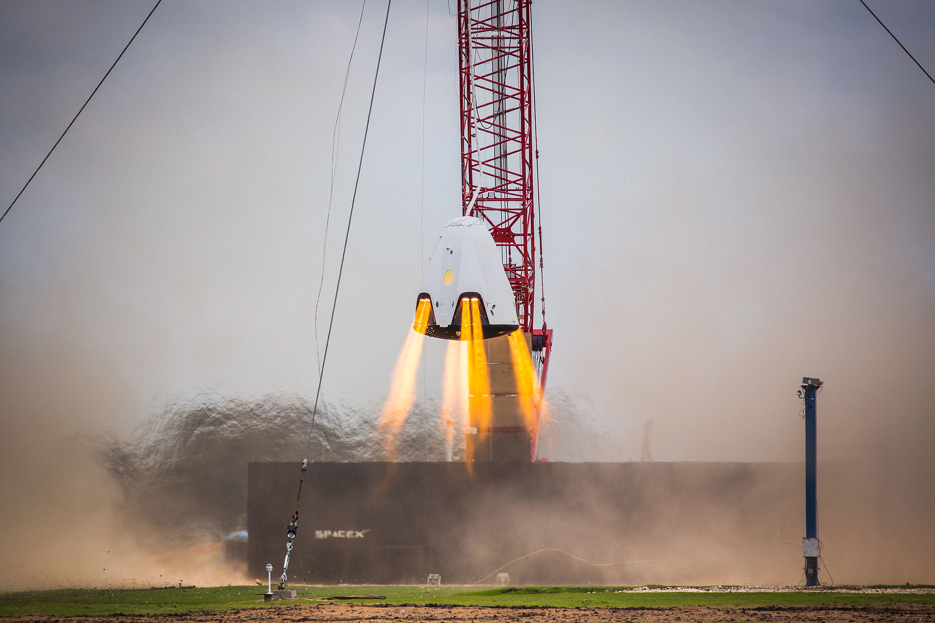 Dragon hover test near large tower